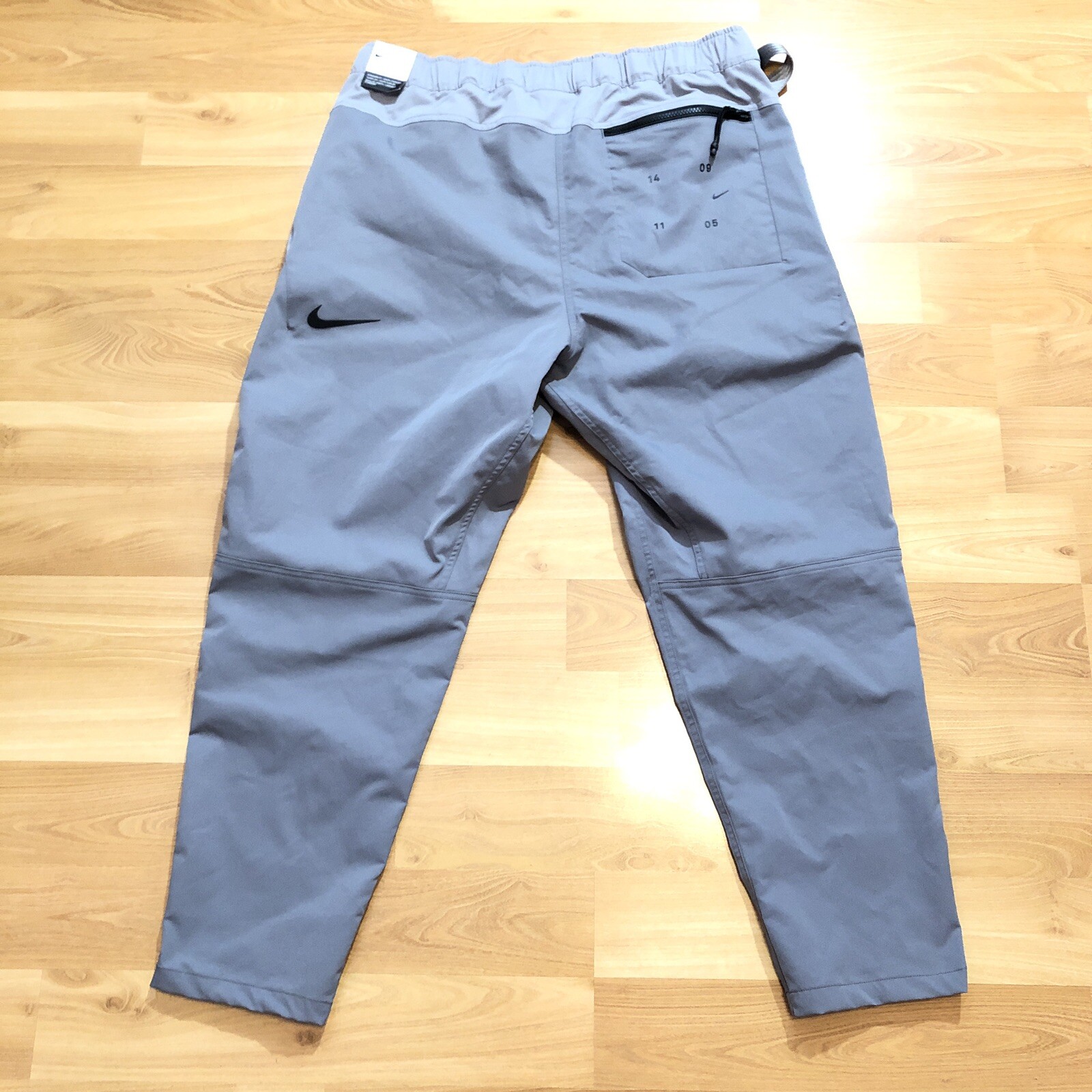 nike tech pack crop pants