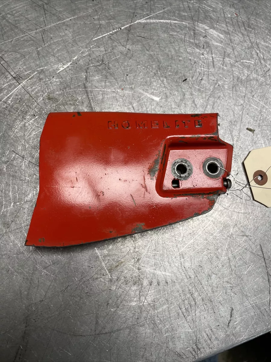 OEM GOOD USED RED HOMELITE 150 AUTOMATIC CHAINSIDE COVER W ADJUSTER 68555
