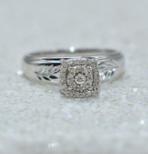0.15 CT TW White Diamond Sterling Silver Halo Engagement/Promise Ring Size 7