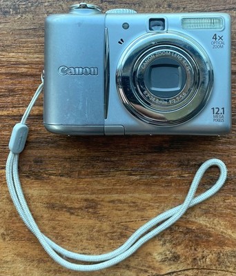 Canon PowerShot A1100 IS 12.1MP Digital Camera 4x Zoom w/ SD Card Tested Working