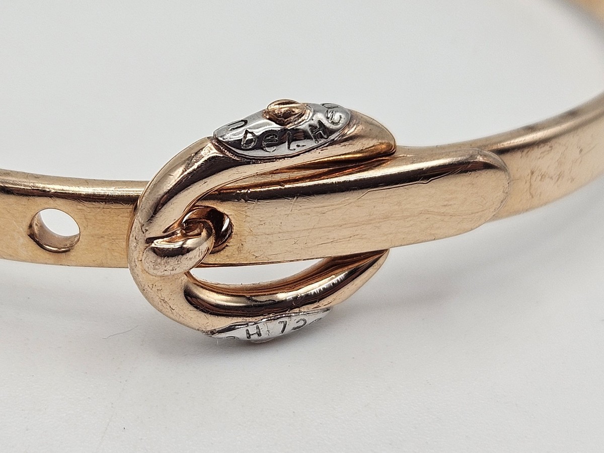 Henri Bendel ヘンリ・ベンデル　腕時計　ゴールド 茶色 Vintage Henri Bendel Gold Tone Hinged Buckle Bangle Bracelet