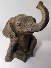 Baby Elephant Sitting. Figurine. Soft Plastic.