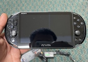 Sony PS Vita - PCH-2000 With  Charger And Left Stick Drift, Sly Cooper G FREE SH