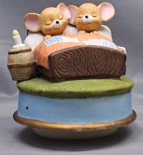 It s a Small World Musical with Sleeping Mice 3.5" tall.  Taiwan
