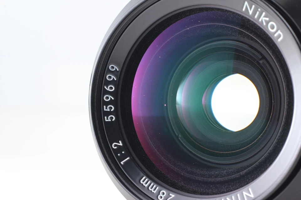 Lente gran angular Nikon Ai Nikkor 28 mm f/2 con capucha HN-1 [Casi como nueva] de JAPÓN Foto 4 de 4