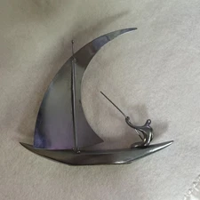 Hagenauer Modernist Person on a Sail Boat Sculpture Chrome 9” Art Deco