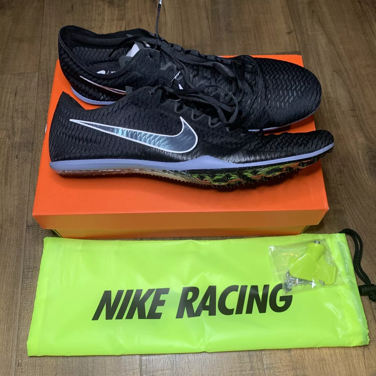 Nike running spikes size 5 sales