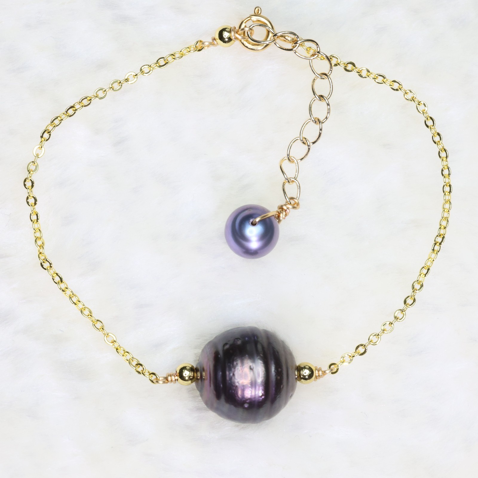 Bracelet perle noire de Tahiti 12,7mm cerclée, le bijou durable qui ne perd jamais son éclat