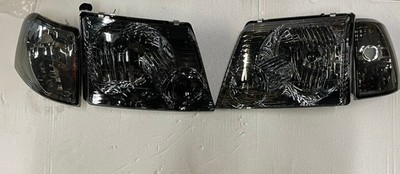 02-05 FORD EXPLORER Amber smoked pair of headlights