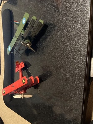 Two model planes one red and one green