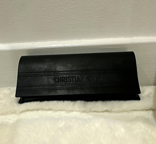 Dior Women’s bag with black tinted glasses