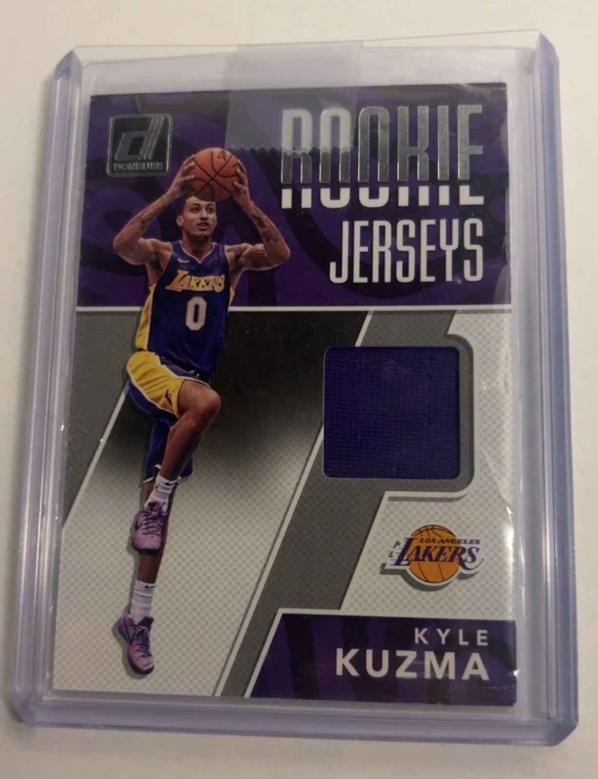 Kyle Kuzma  2017-18 Panini Donruss - Rookie Jerseys #RJ-KK3 (MEM, RC)