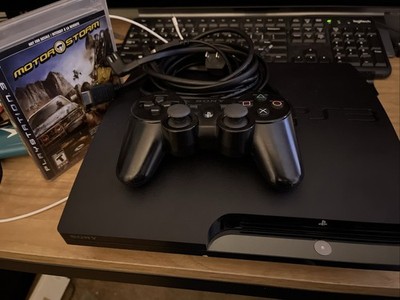PlayStation 3 Slim 1TB W/controller & all Cables Plus A Copy Of Motorstorm.
