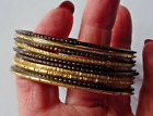 Bracelets and Large Earrings 2 1/2" H x 2" W, Brown tones,