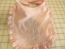 Ruffled baby bib with cross embroidery, baptism bib, pink cotton knit, snap neck