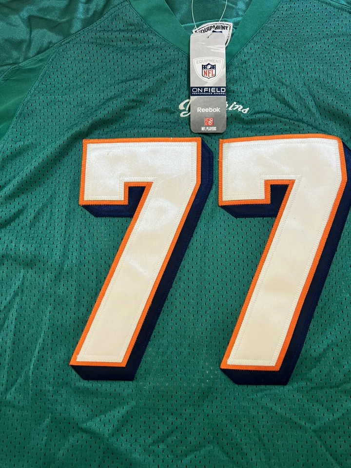 Camiseta deportiva larga de los Miami Dolphins Jake #77 Reebok NFL para hombre 56 azul manga corta Foto 3 de 4