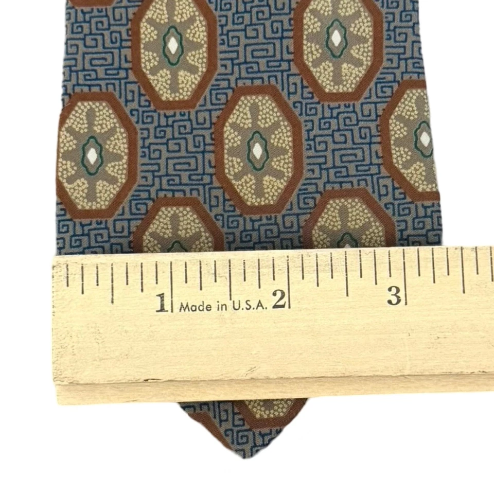 Corbata vintage años 90 Giorgio Armani líneas azul tostado amarillo rojo ovalada mezcla seda Foto 3 de 4