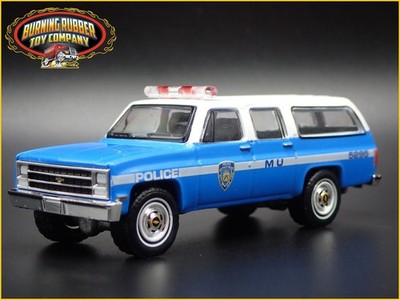 1973-1991 CHEVROLET SUBURBAN K2500 NYPD POLICE SQUAREBODY 1:64 DIECAST MODEL CAR