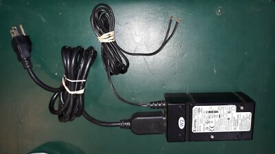 24CC23  EXTRON POWER SUPPLY 28-071-57LF: UNIVERSAL -- 12VDC / 1000MA (12.0VNL)