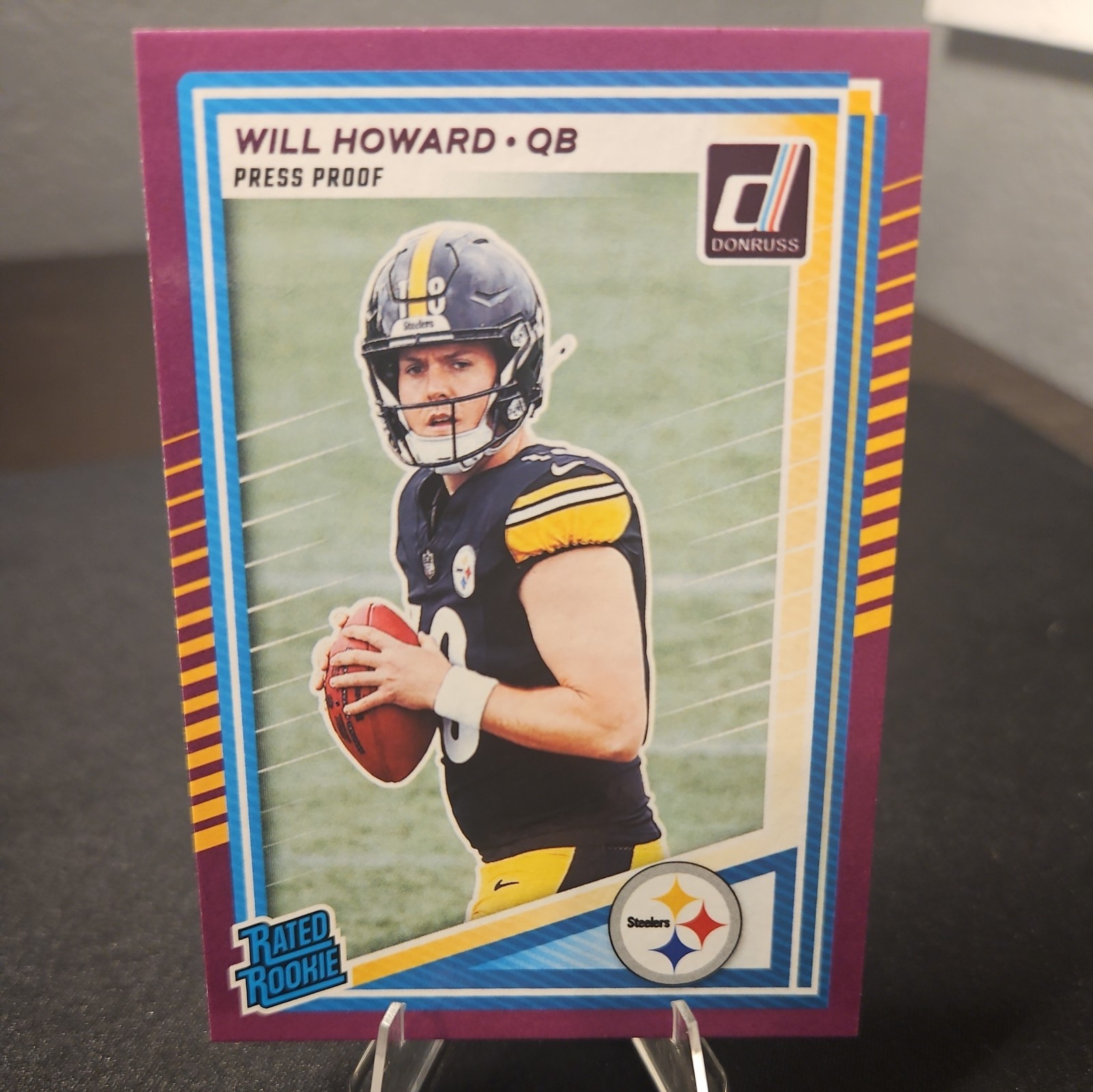 2025 Panini Donruss Will Howard Rated Rookie Purple Press Proof Rookie Card #309