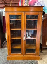 Vintage bookcase / display cabinet with glass doors