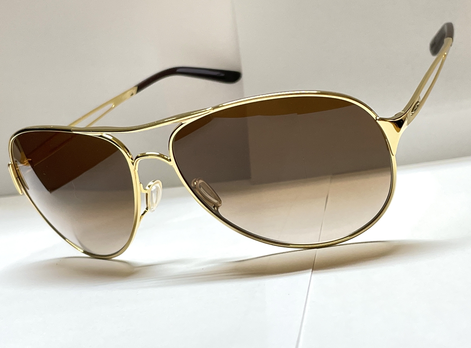 Oakley Sunglasses Caveat Polished Gold Frame Brown Gradient Lens New O004054 eBay