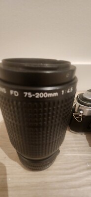 Canon AE-1 Program + FD 1.8 / 50mm Lens, 200mm zoom lens, & flash