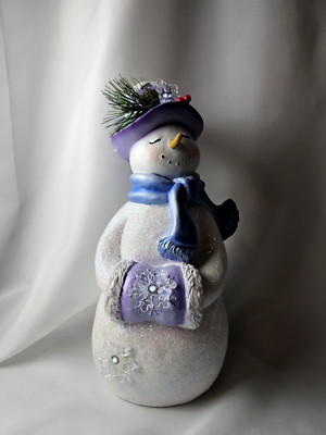 Alpine Corp. Lavender Winter Snowman with Snowflake Lights Statue