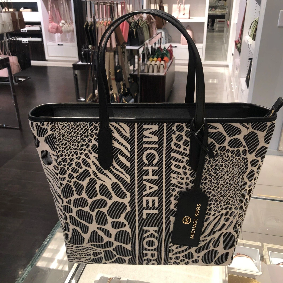 Michael kors black store and white handbag
