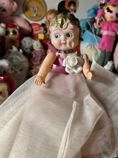 Vintage Celluloid Flapper Jointed Doll in Pink Dress with Floral Accents