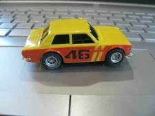 AURORA AFX  #46 BRE DATSUN HO SLOT CAR YELLOW & RED MAG SONIC CHASSIS  NOS