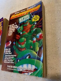 LOT of 2 Books: Nintendo, Genesis, Turbografx 16, Game Gear *Pre-Owned*