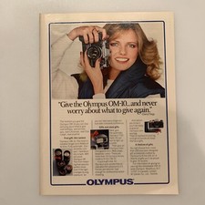 1981 Olympus OM-10 Camera Cheryl Tiegs Model Print Ad Original Never Give Again