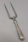 Repousse by Kirk Sterling handle Roast Holder 10 3/8", gently used