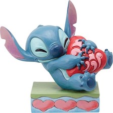 Image of Disney Traditions Stitch Hugging Heart Struck Figurine Enesco 82002