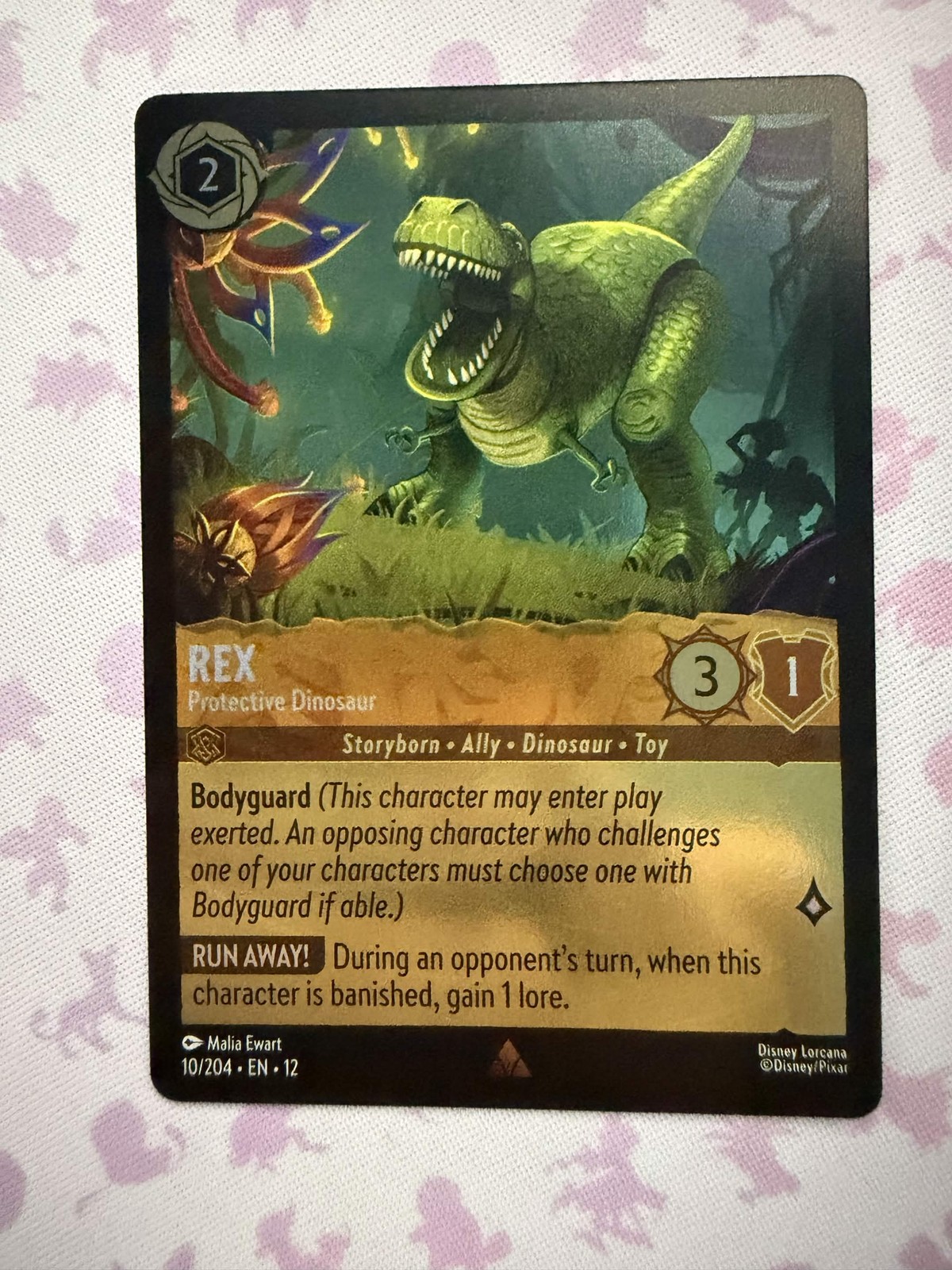 Rex - Protective Dinosaur 10/204 Rare Wilds Unknown Lorcana Cold Foil NM/M
