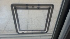 Cat door on mosquito net