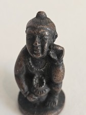antique buddha statue. Kuman thong amulet. Thai Folklore Animism.