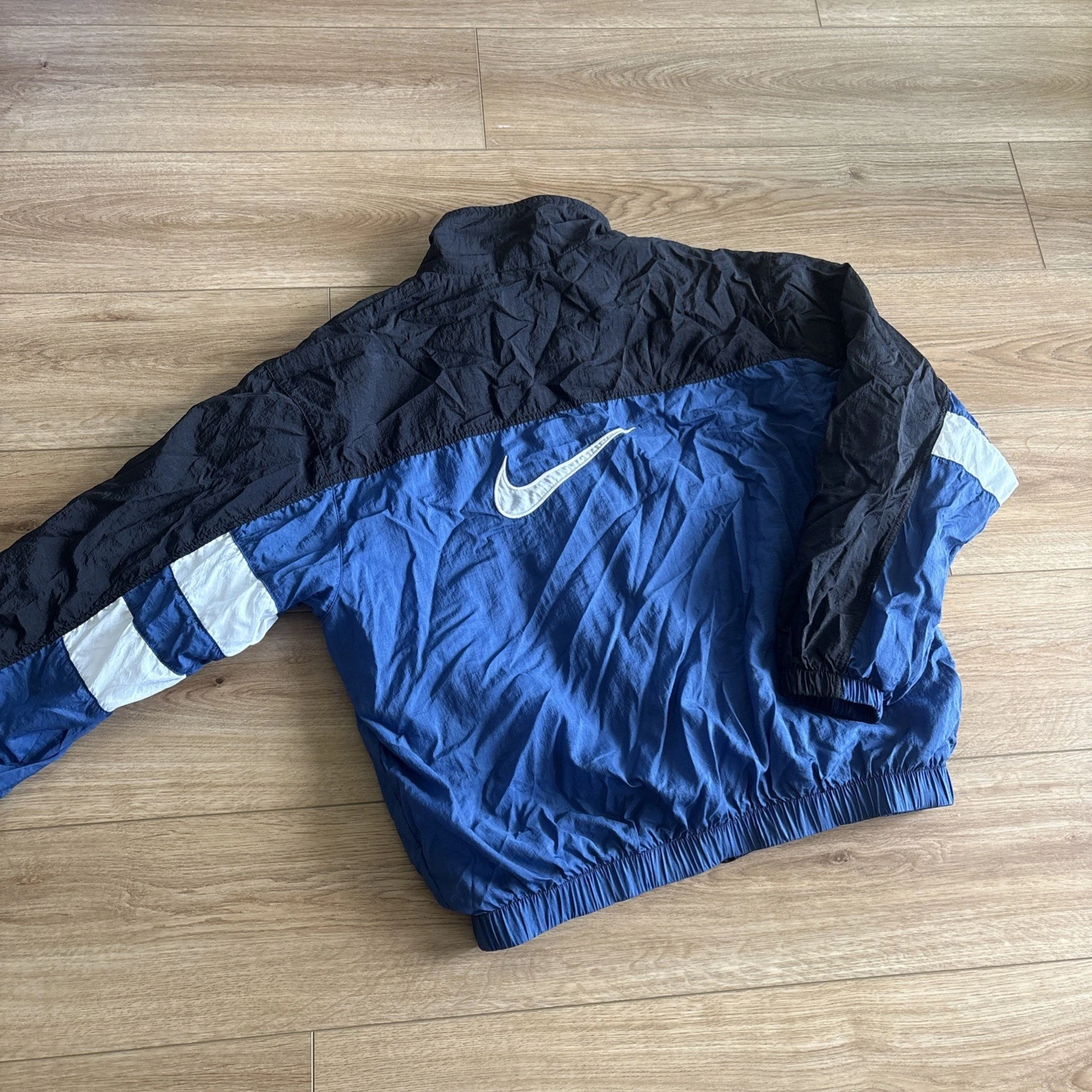 Vintage 90s Nike Windbreaker Jacket swoosh Full Zip Black Blue And White Men's M
Opens in a new wind