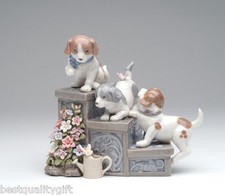 COLLECTIBLE PORCELAIN THREE PUPPIES ON GARDEN STEPS,DOGS " PUPPY LOVE" MUSIC BOX