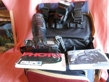 Appareil Photo CANON 620 à pile et à bobine et ses accessoires