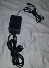 OEM AC Adapter AD-121ANDT 120VAC 60Hz 25W 12VDC 1A