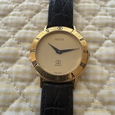 Vintage Gucci Swiss Quartz Gold Tone Roman Numeral Dress Watch
