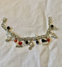 Vintage Music Lover Silver  Tone charm bracel...