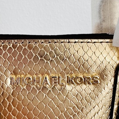 Michael Kors gold leather with embellishments L Jet Set Medium Metallic Leather Clutch in PALE GOLD - Sale  main image 4