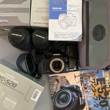 OLYMPUS E 520 two interchangeable lenses CF bag and bonus book set ready to use