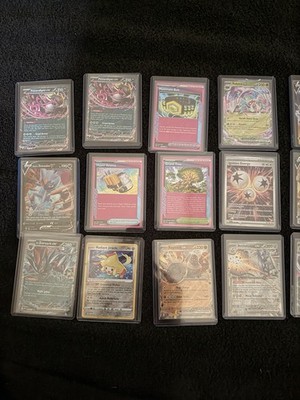 19 Pokemon cards including Exs, trainers and Vs