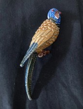Vintage parrot brooch in painted metal
