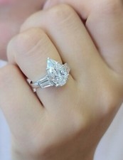 4Ct Pear Cut VVS1 Moissanite Three Stone Engagement Ring 14K White Gold Plated