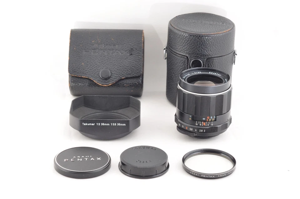 TOP COMO NUEVO Lente Pentax Super Multi Recubrimiento Takumar SMC 35mm f/2 con Estuche para Capucha M42 Foto 2 de 4
